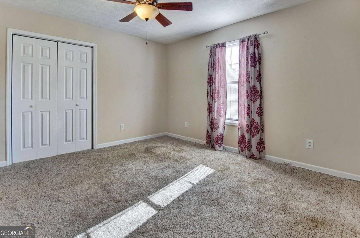 4 bedroom, 2 bathroom, 2,019 sq ft single family residence for sale at 11553 Matthews Trail, Hampton, GA 30228 — photo 10