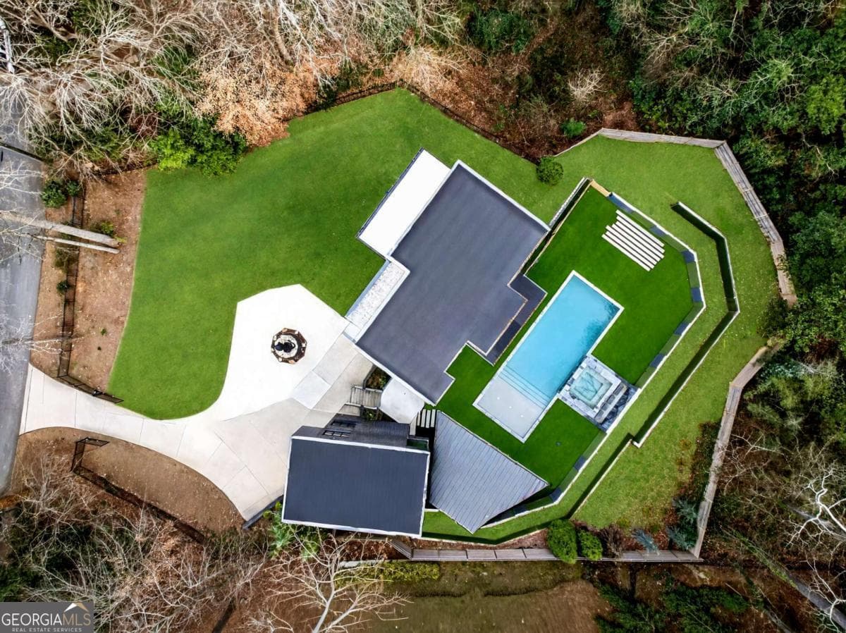 7 bedroom, 6.5 bathroom, 7,396 sq ft single family residence for sale at 345 Pinecrest Road, Atlanta, GA 30342 — photo 6