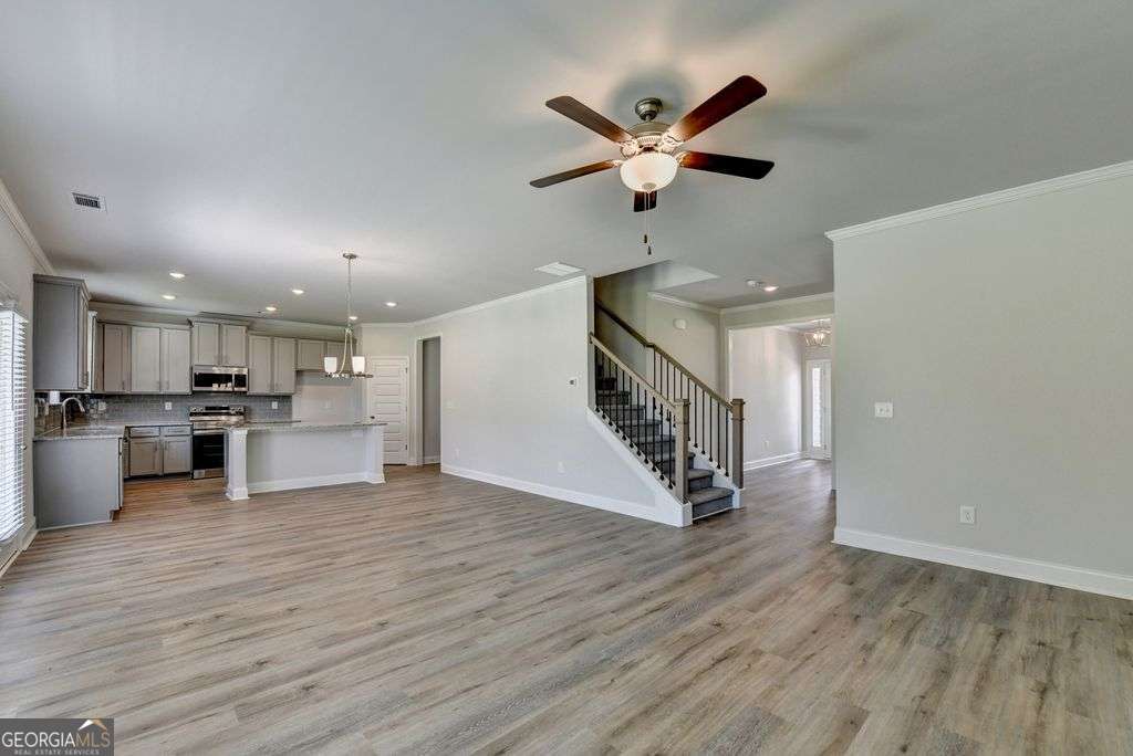 5 bedroom, 3.5 bathroom, 2,562 sq ft single family residence for rent at 7309 Yewtree Drive Walk, Flowery Branch, GA 30542 for $2,750 a month — photo 6
