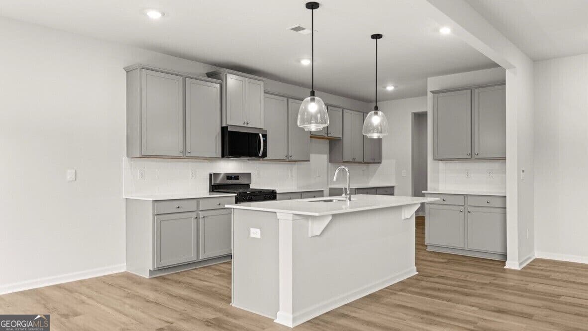 5 bedroom, 3.5 bathroom, 4,062 sq ft single family residence for sale at 3121 Hallsley Drive, South Fulton, GA 30349 — photo 6
