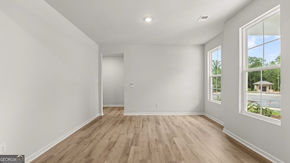 5 bedroom, 3.5 bathroom, 4,062 sq ft single family residence for sale at 3121 Hallsley Drive, South Fulton, GA 30349 — photo 3