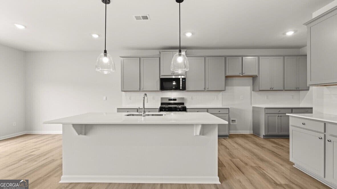 5 bedroom, 3.5 bathroom, 4,062 sq ft single family residence for sale at 3121 Hallsley Drive, South Fulton, GA 30349 — photo 5