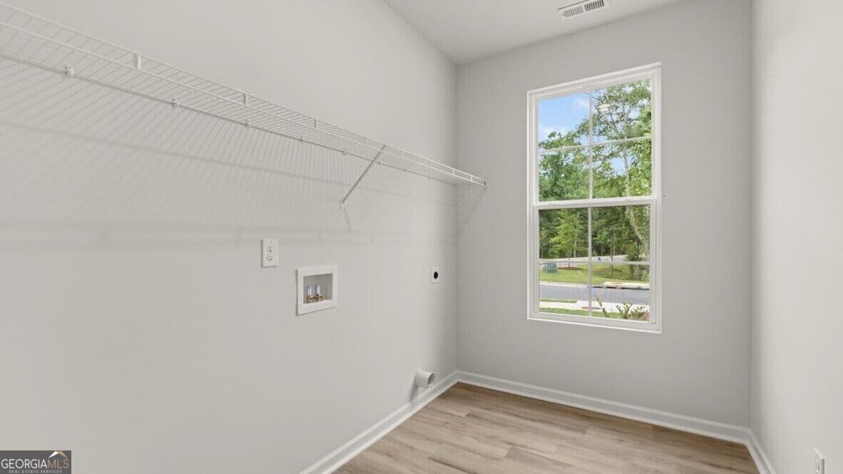 5 bedroom, 3.5 bathroom, 4,062 sq ft single family residence for sale at 3121 Hallsley Drive, South Fulton, GA 30349 — photo 10