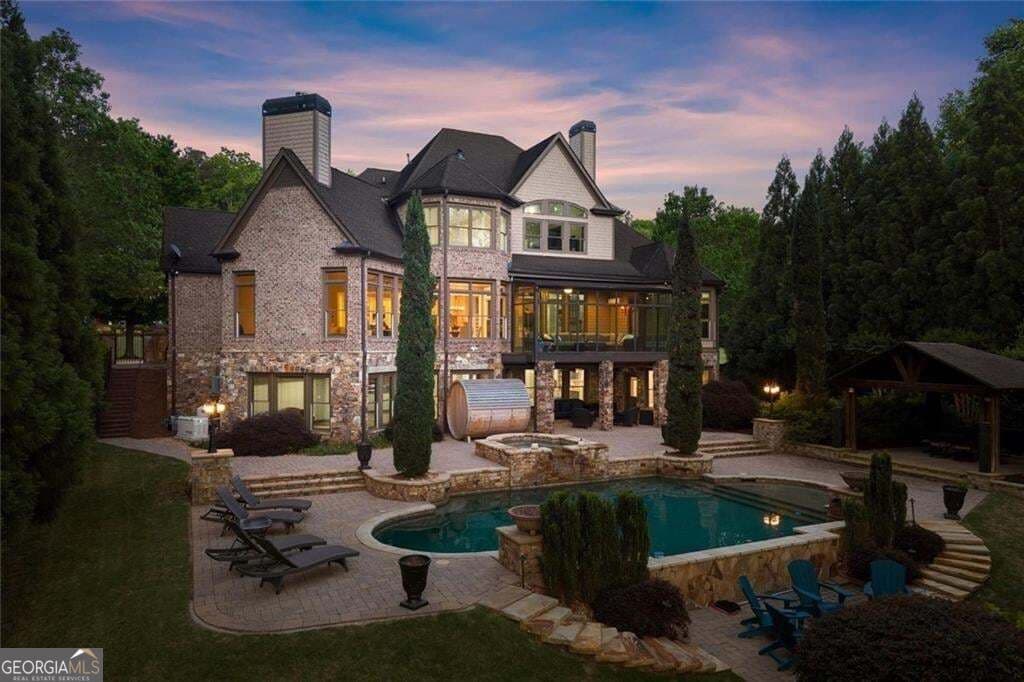 7 bedroom, 5.5 bathroom, 8,433 sq ft single family residence for sale at 1225 Waterfall Lane, Acworth, GA 30101 — photo 2