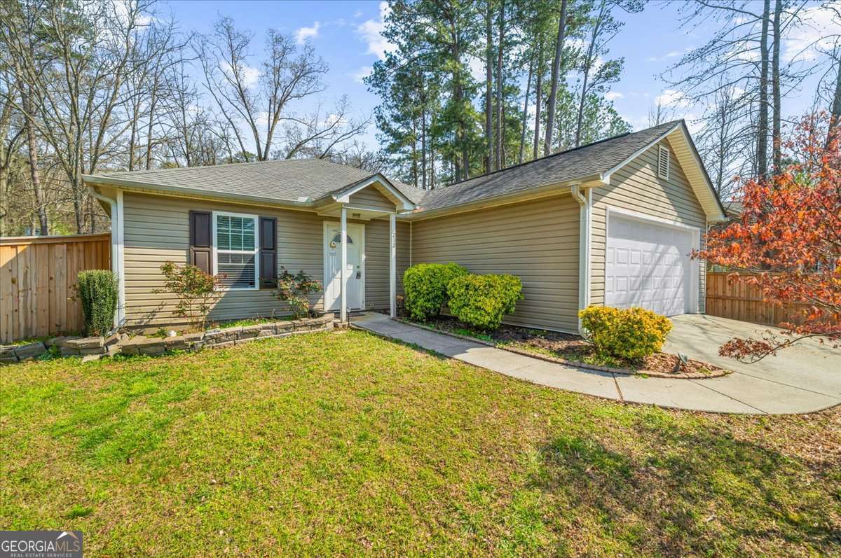 3 bedroom, 2 bathroom, 1,360 sq ft single family residence for sale at 212 Whispering Pine Circle, White, GA 30184 — photo 4