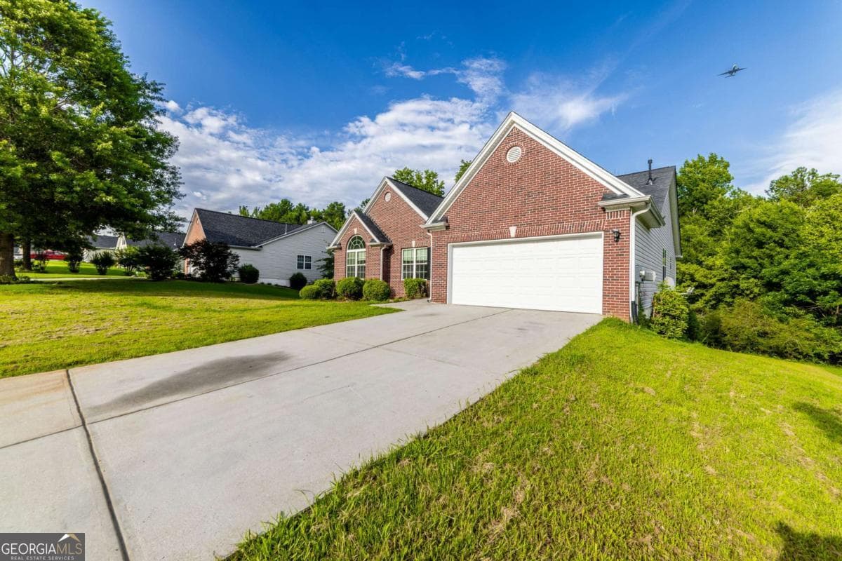 3 bedroom, 2 bathroom, 2,185 sq ft single family residence for sale at 1784 Cedar Walk Lane, Conley, GA 30288 — photo 9