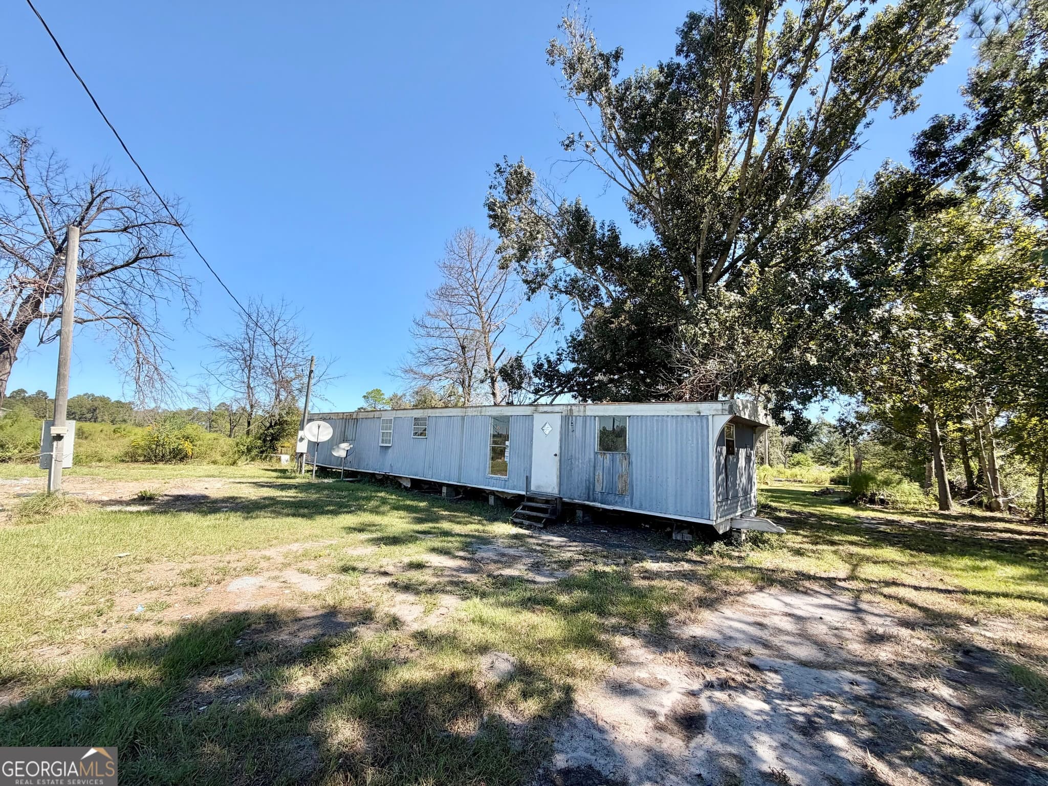 1 bedroom, 1 bathroom, 980 sq ft single family residence for sale at 651 Hatton Still Road, Hazlehurst, GA 31539 — photo 2