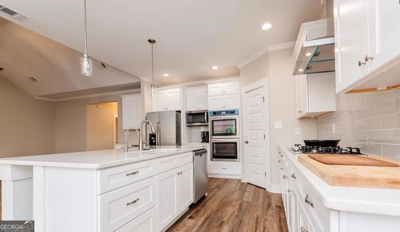 4 bedroom, 3.5 bathroom, 2,696 sq ft single family residence for sale at 75 Creekside Court, Forsyth, GA 31029 — photo 8