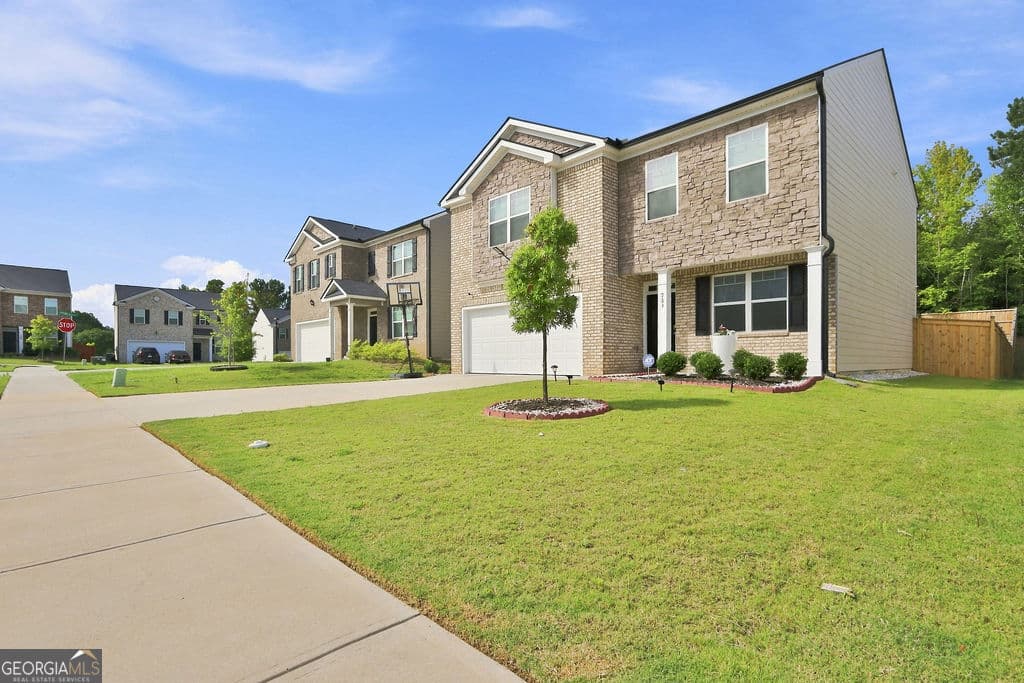 4 bedroom, 2.5 bathroom, 2,206 sq ft single family residence for sale at 723 Millwood Drive, Dacula, GA 30019 — photo 7