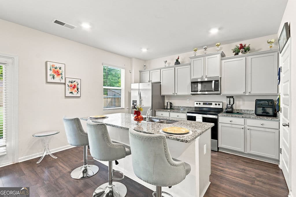 4 bedroom, 2.5 bathroom, 2,206 sq ft single family residence for sale at 723 Millwood Drive, Dacula, GA 30019 — photo 3