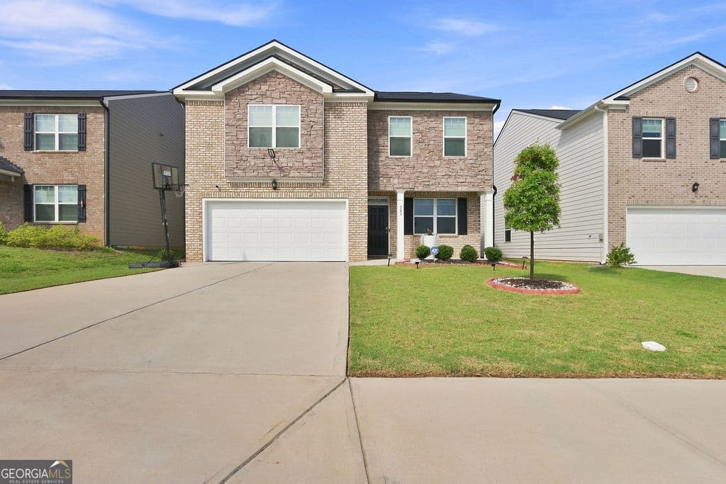 4 bedroom, 2.5 bathroom, 2,206 sq ft single family residence for sale at 723 Millwood Drive, Dacula, GA 30019 — photo 1 of 34