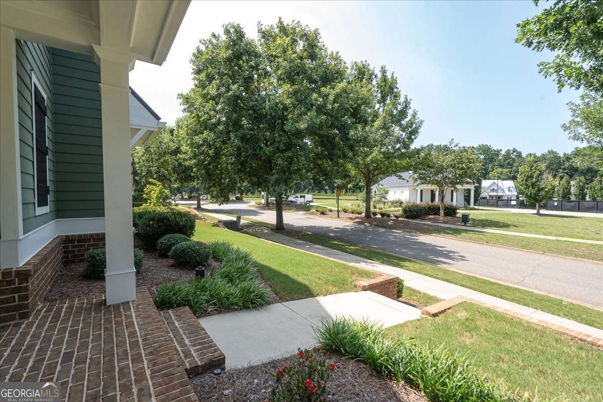 4 bedroom, 4.5 bathroom, 3,239 sq ft single family residence for sale at 1706 Georgia Club Drive, Statham, GA 30666 — photo 6