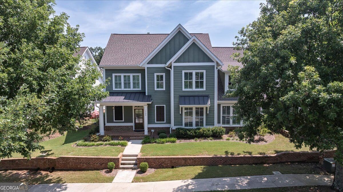 4 bedroom, 4.5 bathroom, 3,239 sq ft single family residence for sale at 1706 Georgia Club Drive, Statham, GA 30666 — photo 1 of 47
