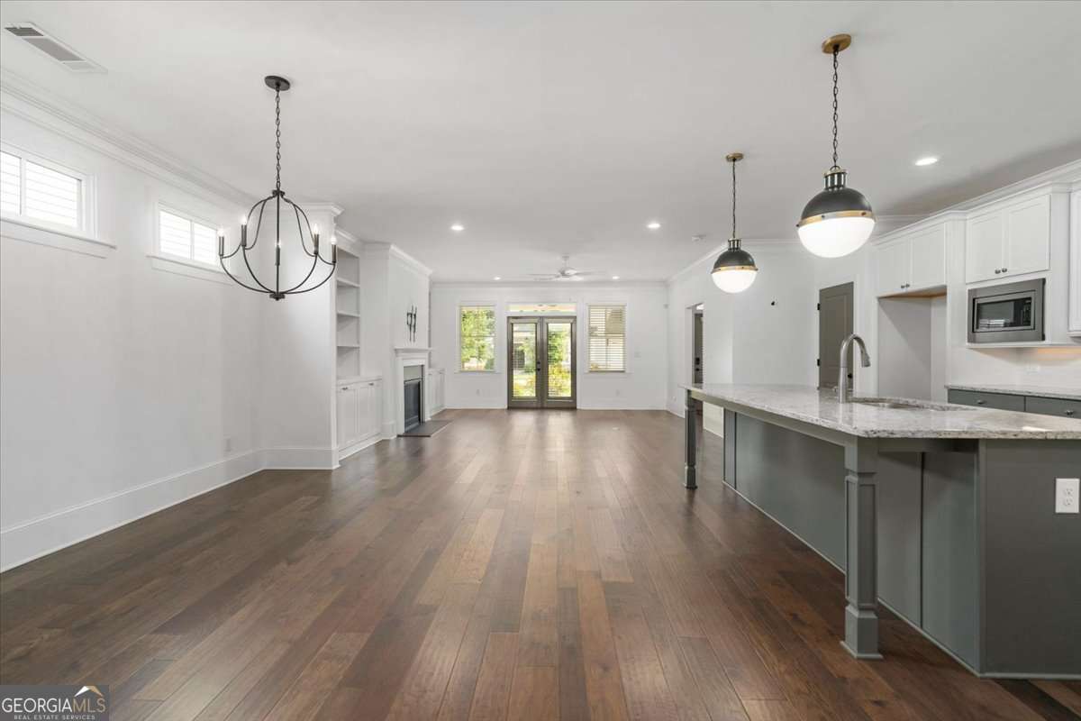 4 bedroom, 4.5 bathroom, 3,239 sq ft single family residence for sale at 1706 Georgia Club Drive, Statham, GA 30666 — photo 5