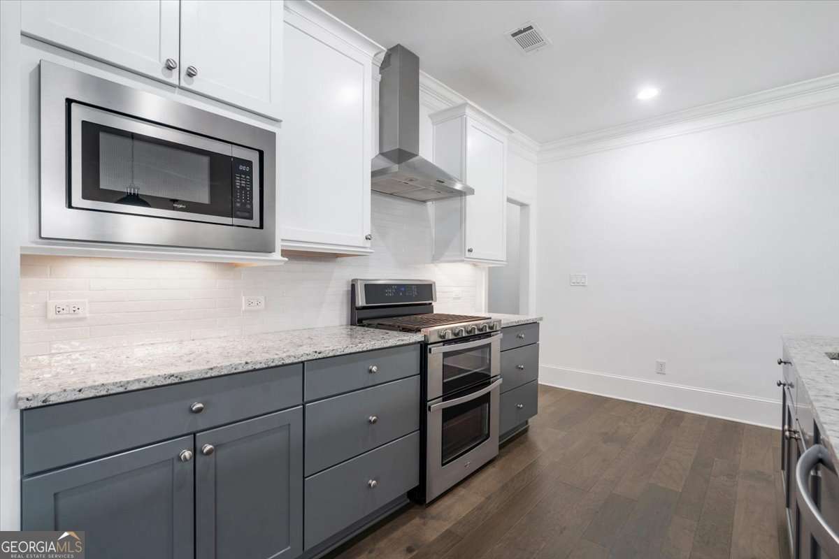4 bedroom, 4.5 bathroom, 3,239 sq ft single family residence for sale at 1706 Georgia Club Drive, Statham, GA 30666 — photo 9