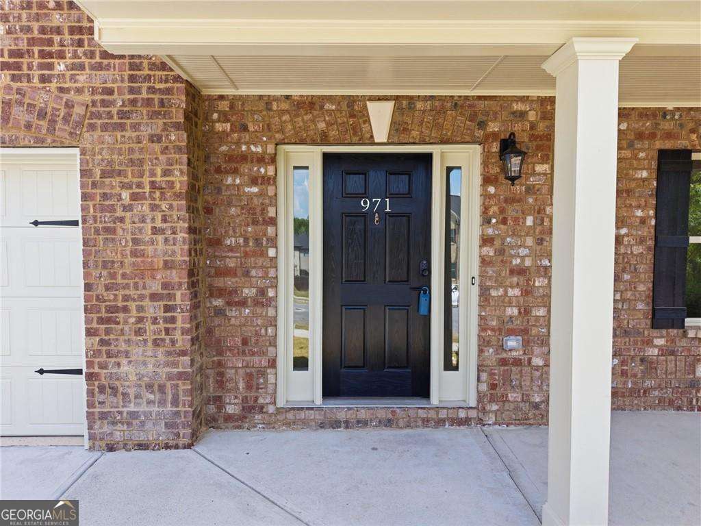 5 bedroom, 3 bathroom, 2,442 sq ft single family residence for sale at 971 Overlook Path Way, Lawrenceville, GA 30045 — photo 5