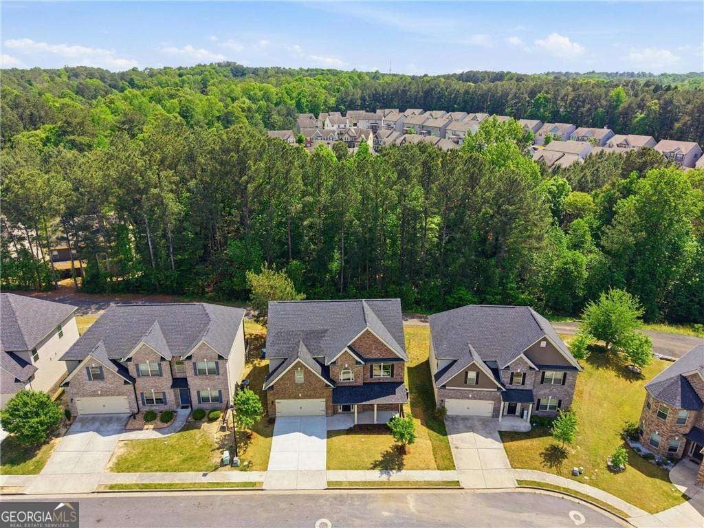 5 bedroom, 3 bathroom, 2,442 sq ft single family residence for sale at 971 Overlook Path Way, Lawrenceville, GA 30045 — photo 4