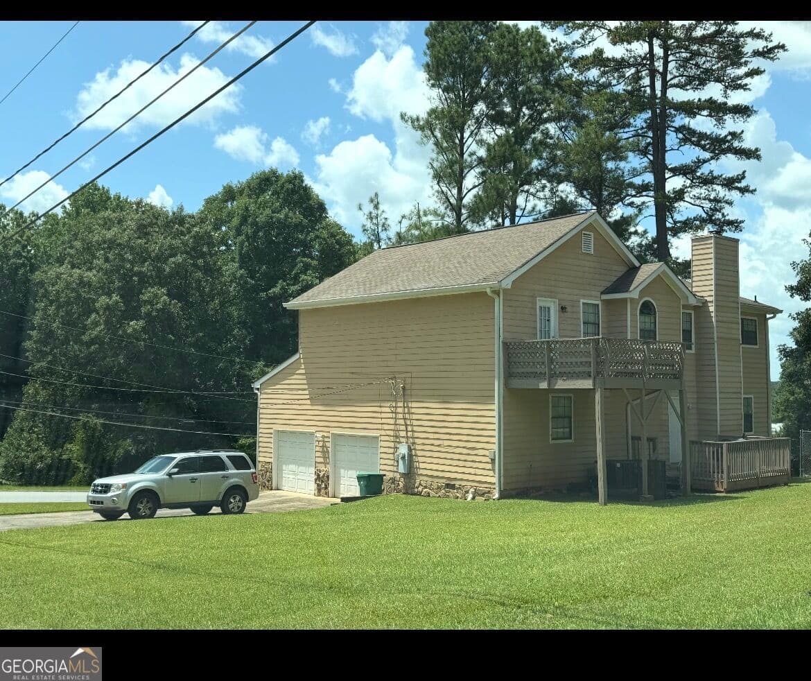 3 bedroom, 3 bathroom, 1,836 sq ft single family residence for sale at 3803 Raiders Ridge Drive, Lithonia, GA 30038 — photo 2