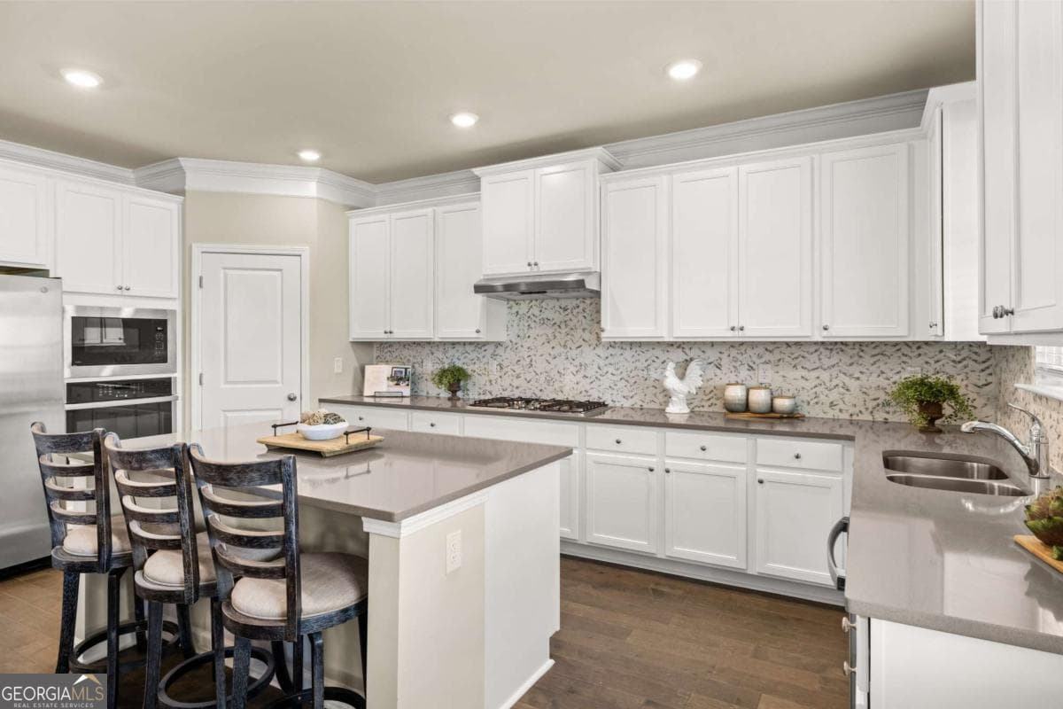 5 bedroom, 4 bathroom, 3,167 sq ft single family residence for sale at 1807 Kingsmere Run Drive LOT 35, Loganville, GA 30052 — photo 10