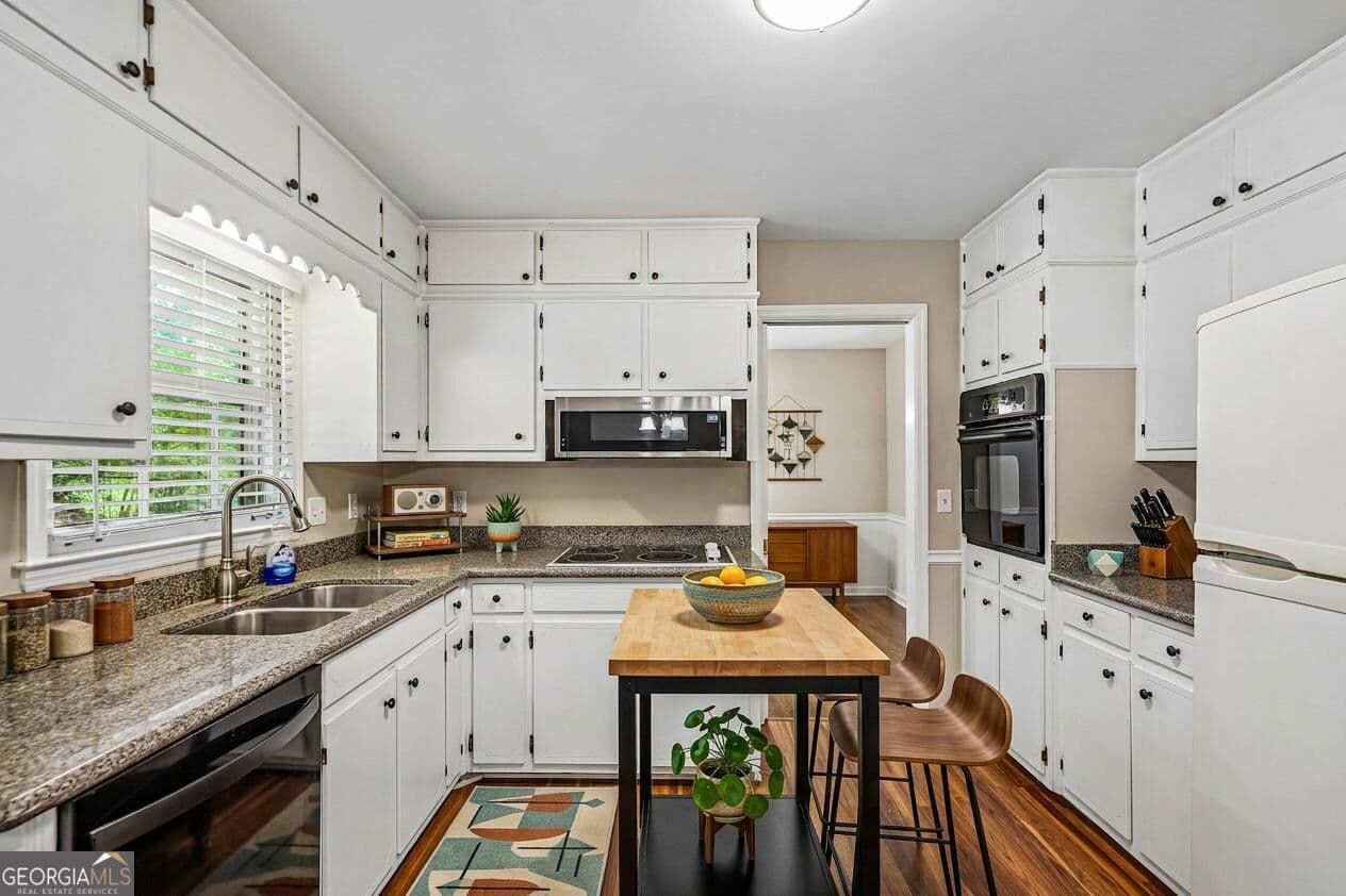 4 bedroom, 2.5 bathroom, 2,267 sq ft single family residence for sale at 4254 Wheaton Lane, Clarkston, GA 30021 — photo 4