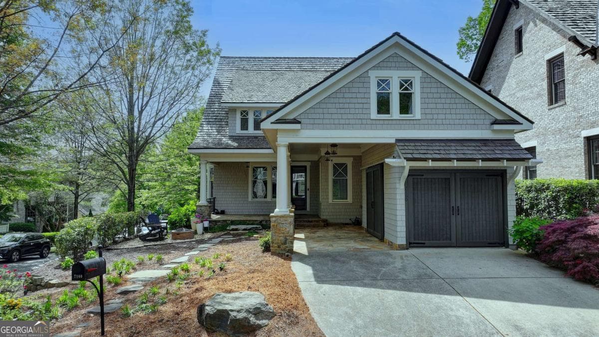 4 bedroom, 5.5 bathroom single family residence sold at 7160 Round Road, Cumming, GA 30040
