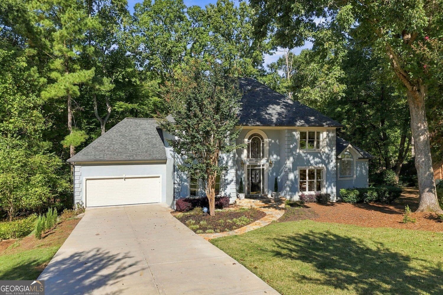4 bedroom, 3.5 bathroom, 5,115 sq ft single family residence for sale at 12190 Brookfield Club Drive, Roswell, GA 30075 — photo 2