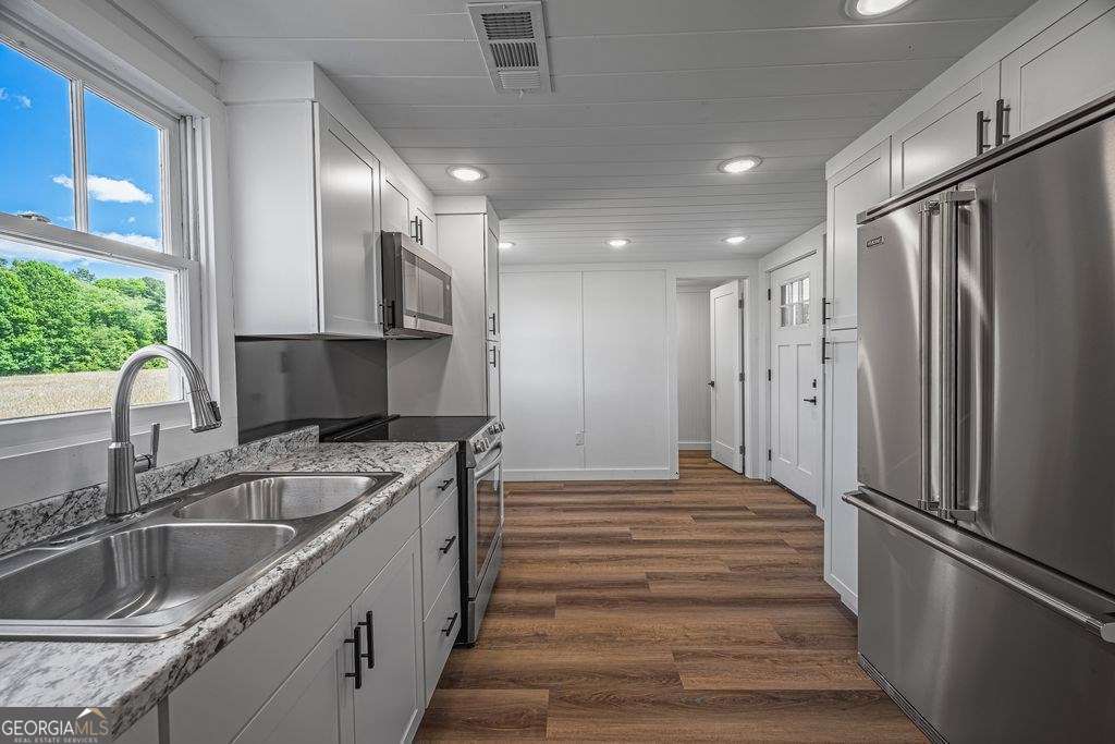 3 bedroom, 2 bathroom, 1,444 sq ft single family residence for sale at 9340 Old Hwy 76, Morganton, GA 30560 — photo 6