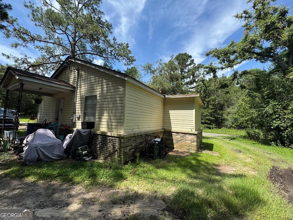 2 bedroom, 1 bathroom, 834 sq ft single family residence sold at 180 West Wesley Avenue, Lyons, GA 30436