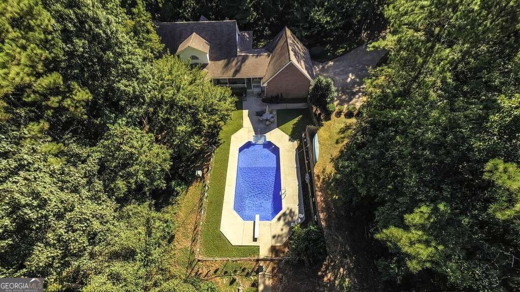4 bedroom, 3.5 bathroom, 2,306 sq ft single family residence for sale at 8285 Mill Run Trail, Whitesburg, GA 30185 — photo 6