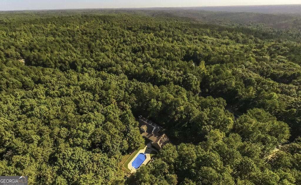 4 bedroom, 3.5 bathroom, 2,306 sq ft single family residence for sale at 8285 Mill Run Trail, Whitesburg, GA 30185 — photo 8