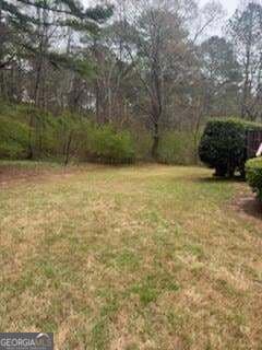 4 bedroom, 3.5 bathroom, 6,045 sq ft single family residence for sale at 117 Watkins Glen Drive, Mcdonough, GA 30252 — photo 2