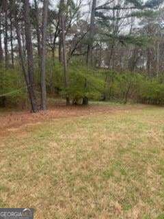 4 bedroom, 3.5 bathroom, 6,045 sq ft single family residence for sale at 117 Watkins Glen Drive, Mcdonough, GA 30252 — photo 4