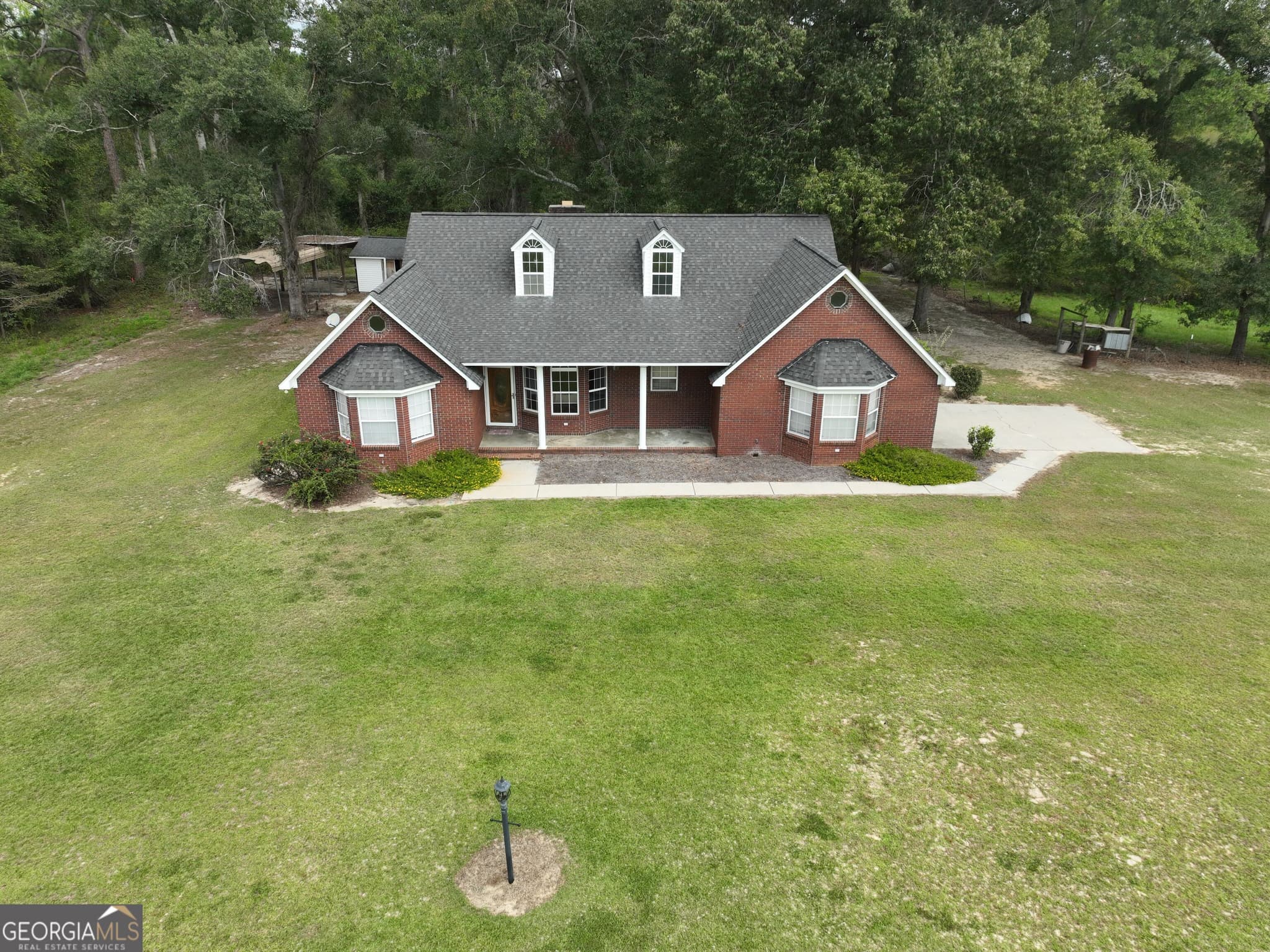 3 bedroom, 2 bathroom, 2,393 sq ft single family residence for sale at 28262 Canoochee Road, Metter, GA 30439 — photo 2