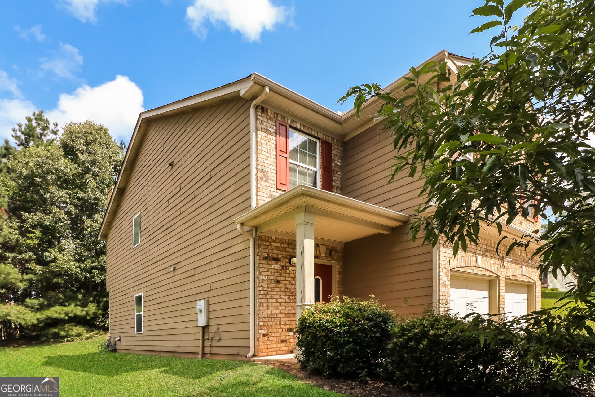 4 bedroom, 2.5 bathroom, 2,378 sq ft single family residence for sale at 7478 Absinth Drive, Atlanta, GA 30349 — photo 2