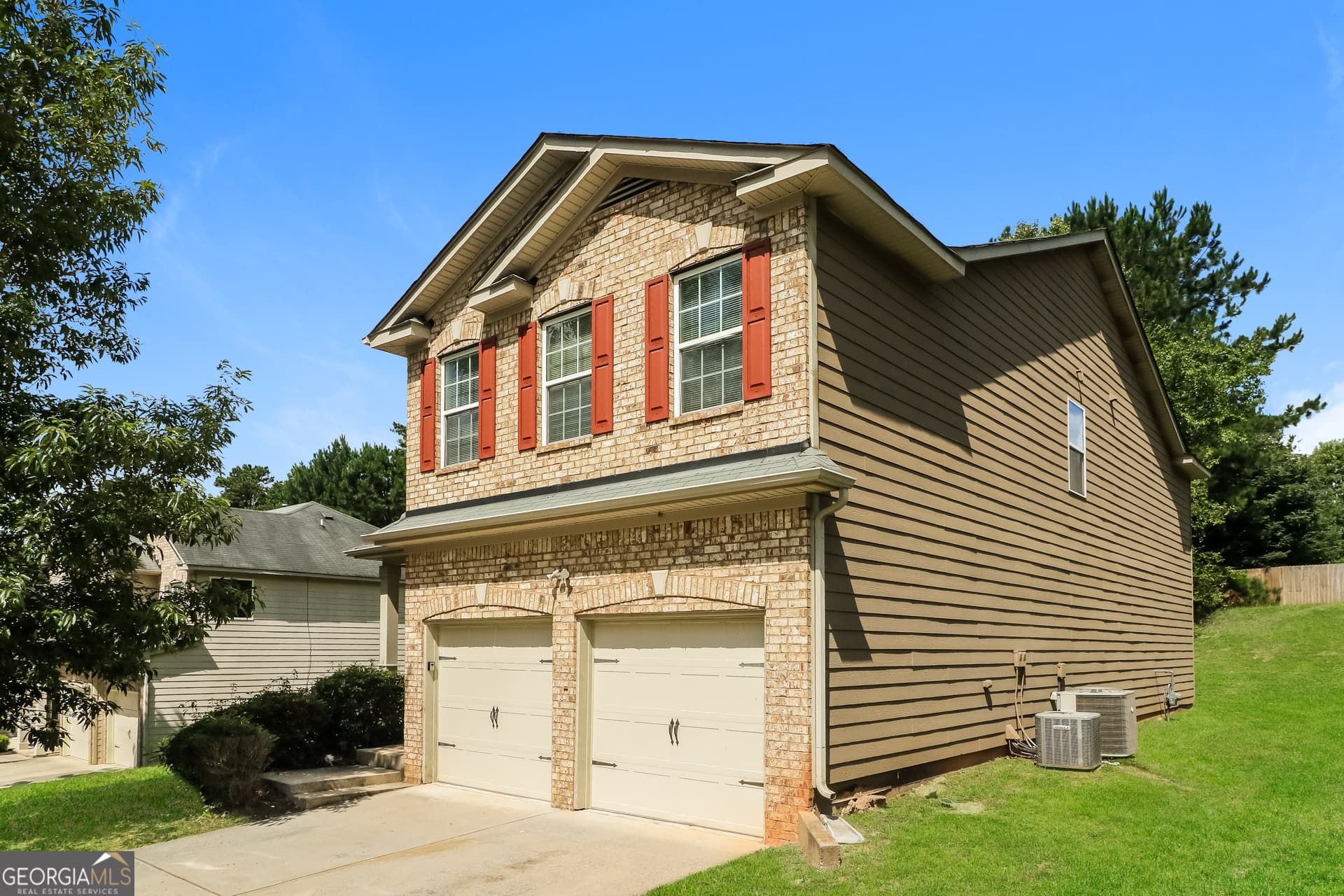 4 bedroom, 2.5 bathroom, 2,378 sq ft single family residence for sale at 7478 Absinth Drive, Atlanta, GA 30349 — photo 3