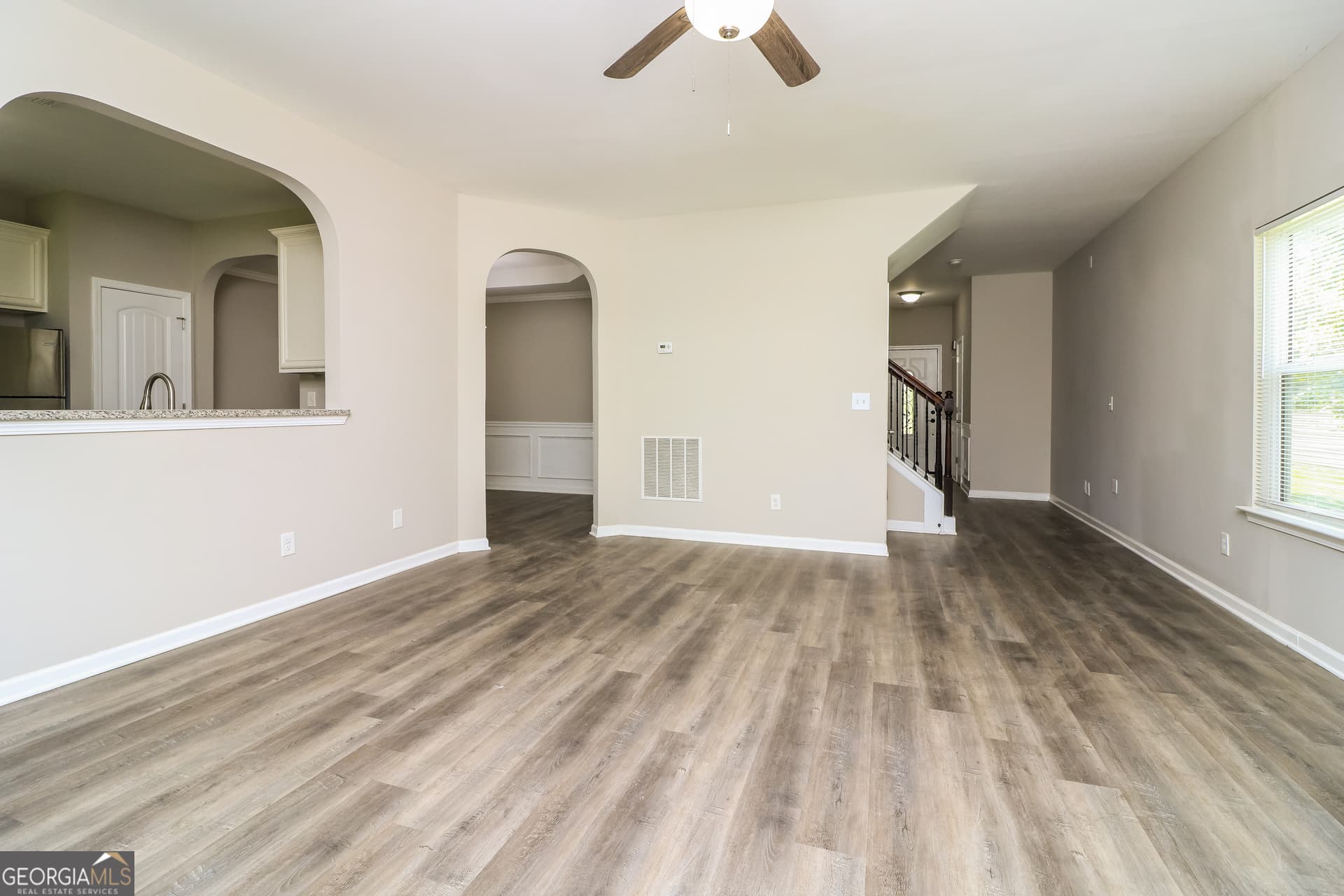 4 bedroom, 2.5 bathroom, 2,378 sq ft single family residence for sale at 7478 Absinth Drive, Atlanta, GA 30349 — photo 5