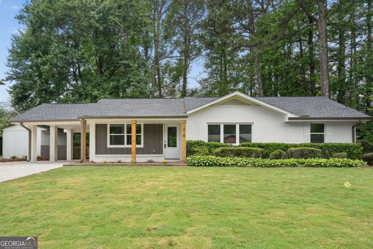4 bedroom, 3 bathroom, 1,917 sq ft single family residence sold at 1818 Briarlake Circle, Decatur, GA 30033