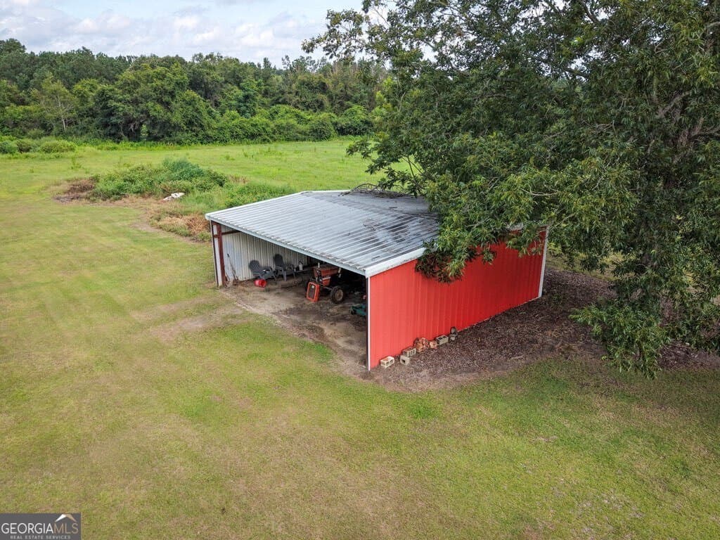 3 bedroom, 3 bathroom, 2,495 sq ft single family residence for sale at 1814 Antioch-Greggs Road, Adel, GA 31620 — photo 4