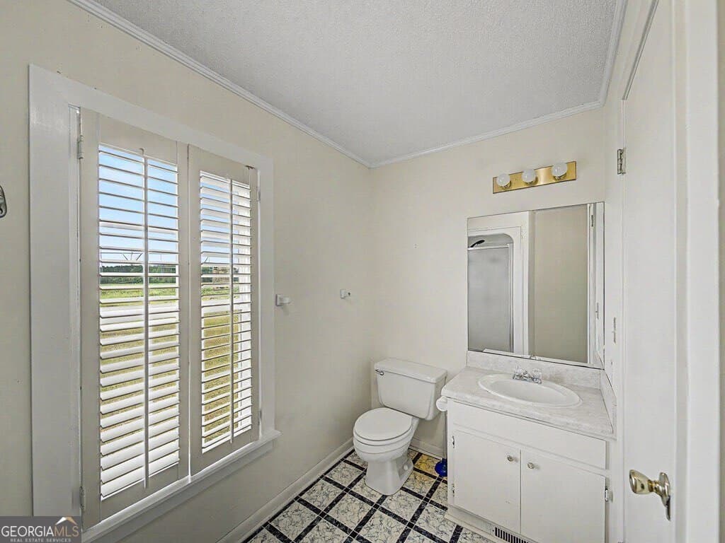 3 bedroom, 3 bathroom, 2,495 sq ft single family residence for sale at 1814 Antioch-Greggs Road, Adel, GA 31620 — photo 8