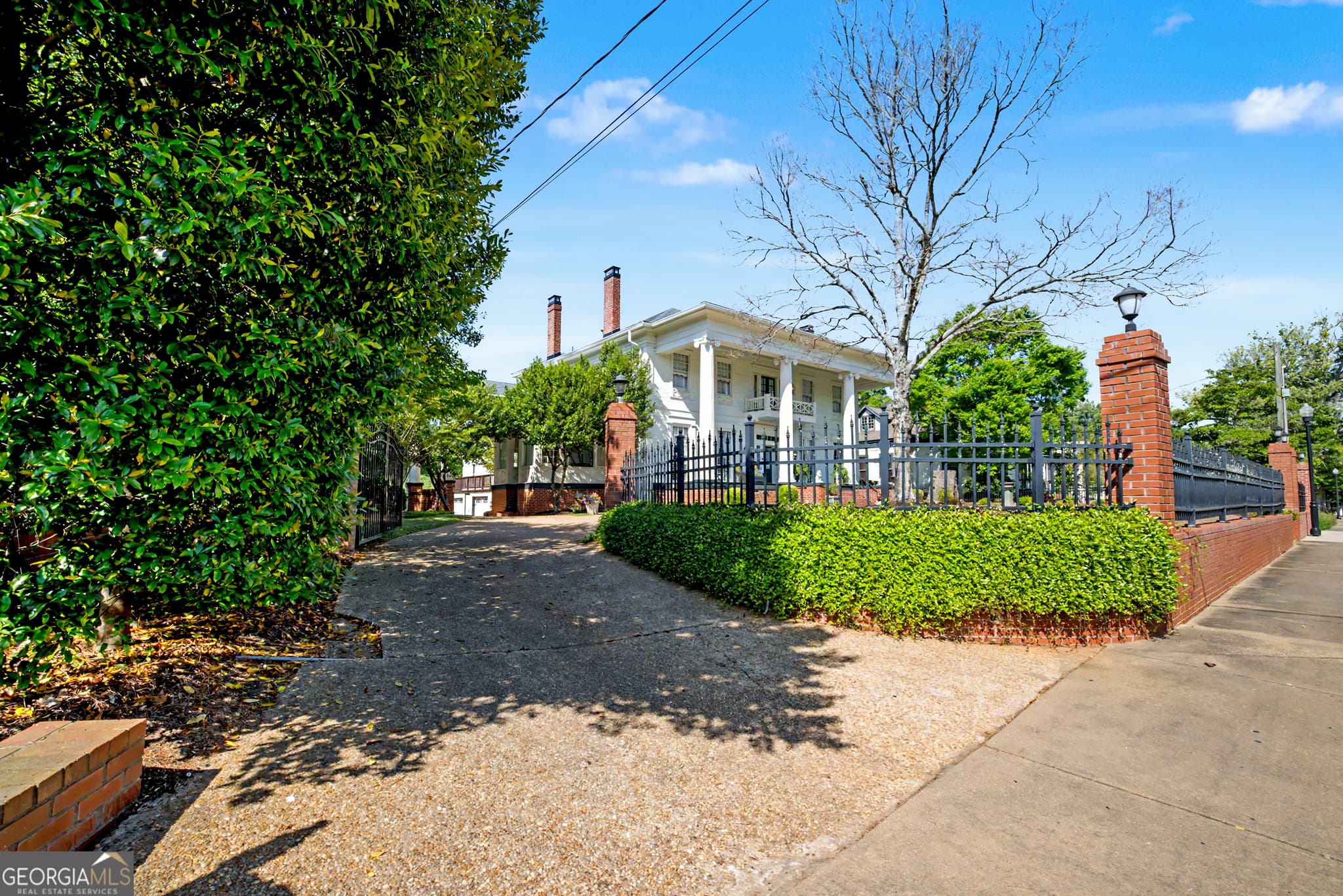 6 bedroom, 5.5 bathroom, 6,360 sq ft single family residence for sale at 141 Greenville Street, Newnan, GA 30263 — photo 4