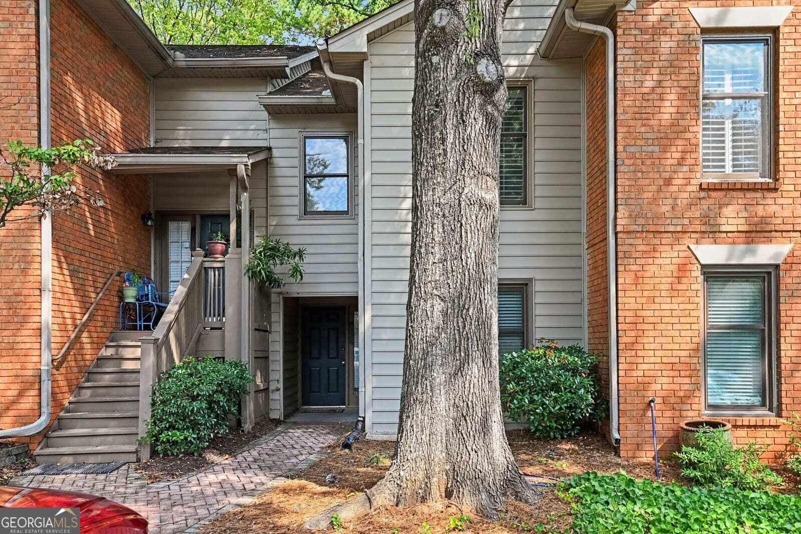 3 bedroom, 2 bathroom, 1,650 sq ft condominium for sale at 105 Garden Court, Atlanta, GA 30328 — photo 1 of 36