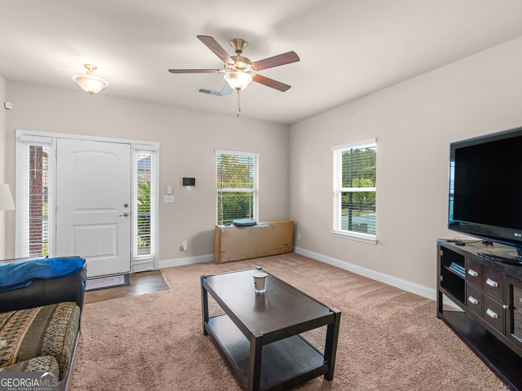 4 bedroom, 3 bathroom, 2,378 sq ft single family residence for sale at 12236 Anchor Way, Hampton, GA 30228 — photo 3