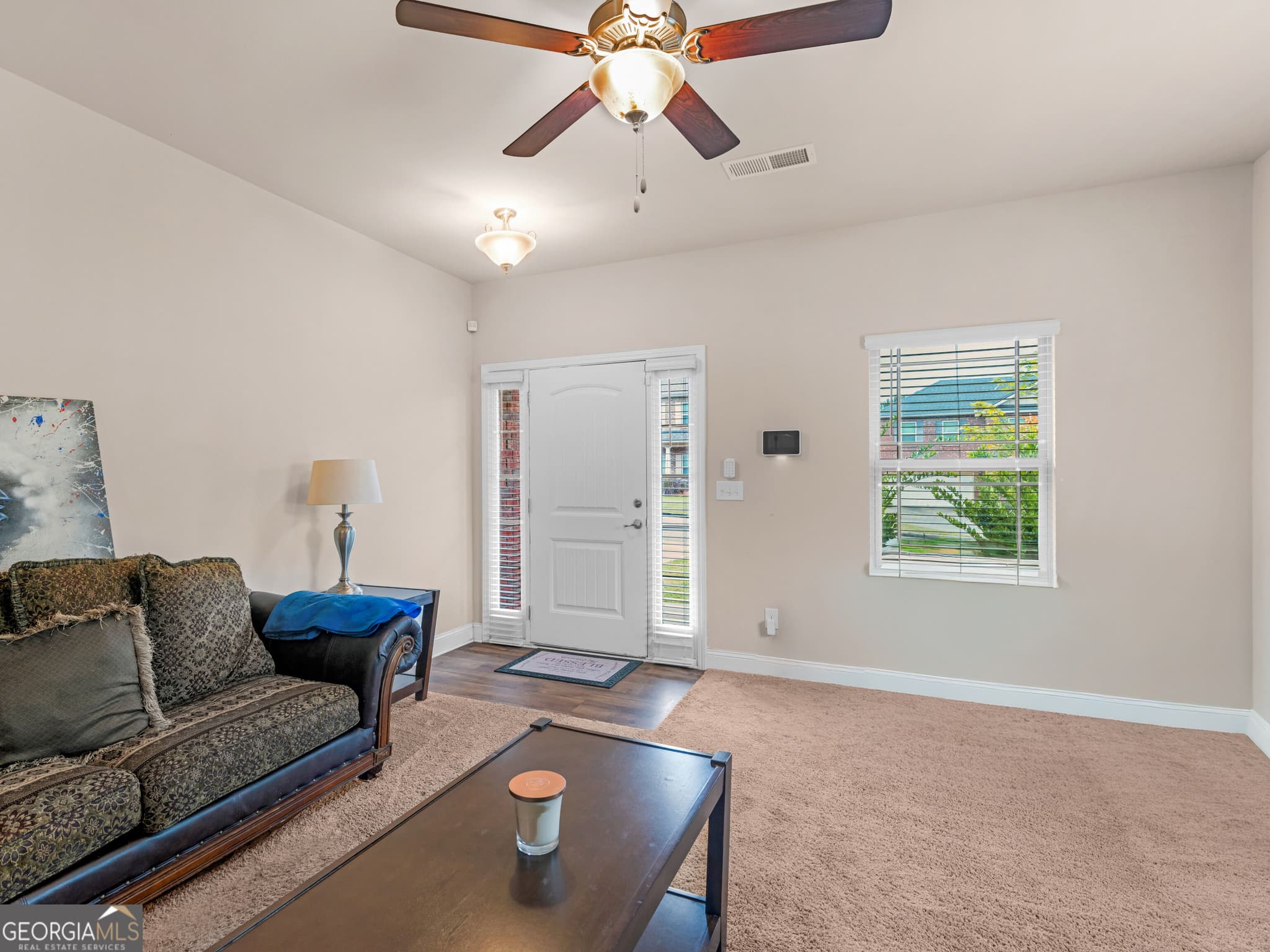 4 bedroom, 3 bathroom, 2,378 sq ft single family residence for sale at 12236 Anchor Way, Hampton, GA 30228 — photo 4