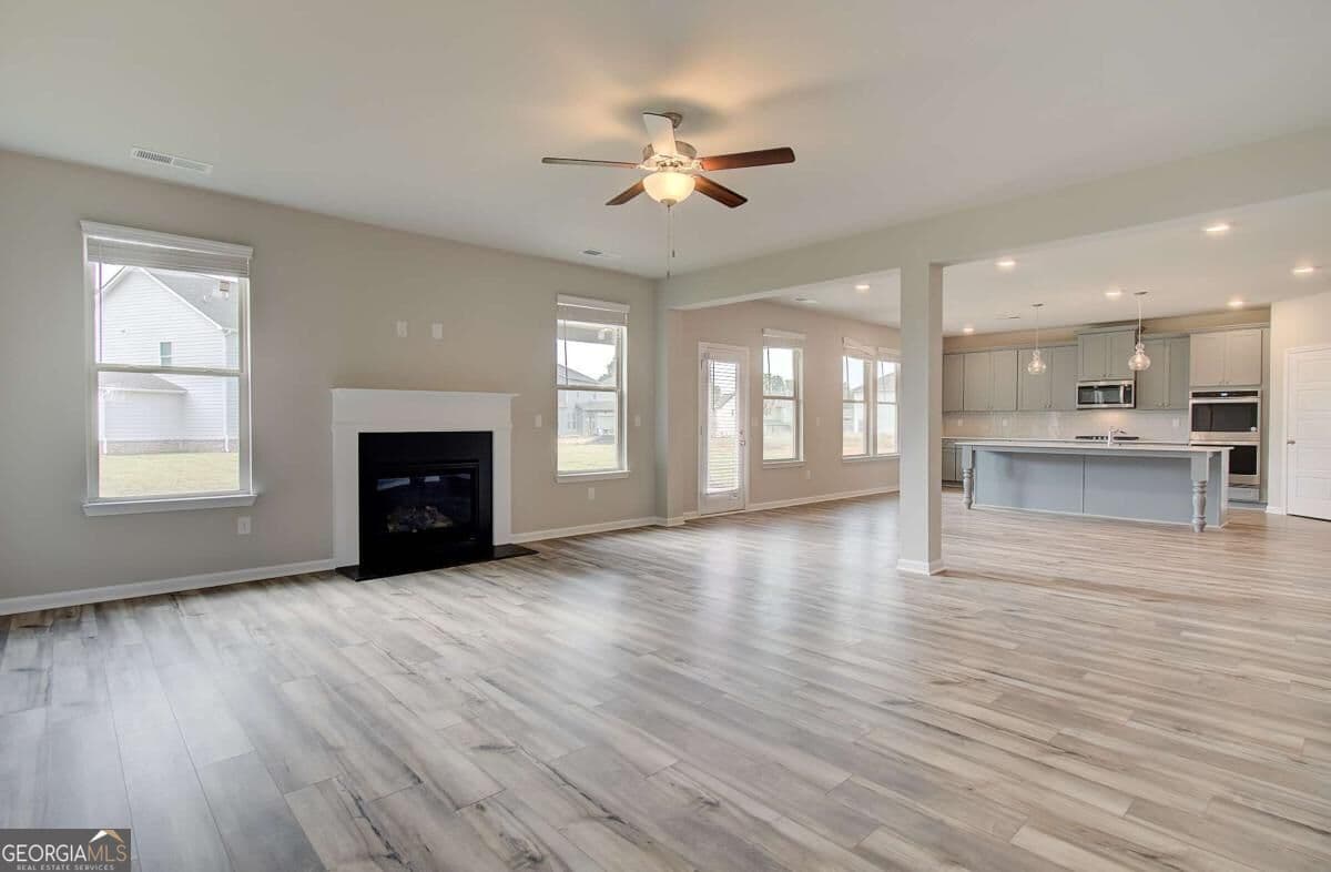 5 bedroom, 3.5 bathroom, 3,669 sq ft single family residence for sale at 408 Sheridan Drive, Stockbridge, GA 30281 — photo 7