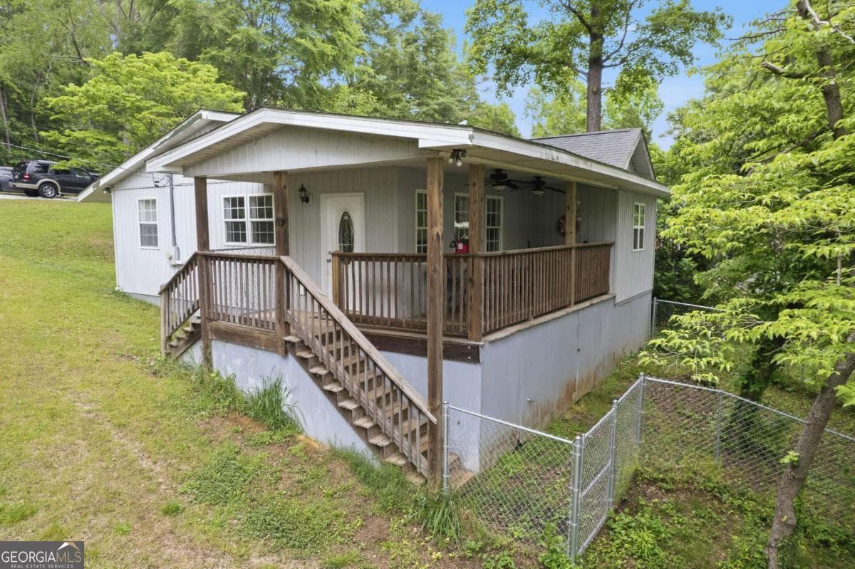 2 bedroom, 1 bathroom, 1,006 sq ft cabin,single family residence for sale at 114 Flatrock Road, Eatonton, GA 31024 — photo 1 of 28