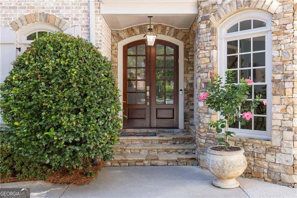 6 bedroom, 5.5 bathroom, 7,295 sq ft single family residence for sale at 7750 Marsh Court, Sandy Springs, GA 30328 — photo 3