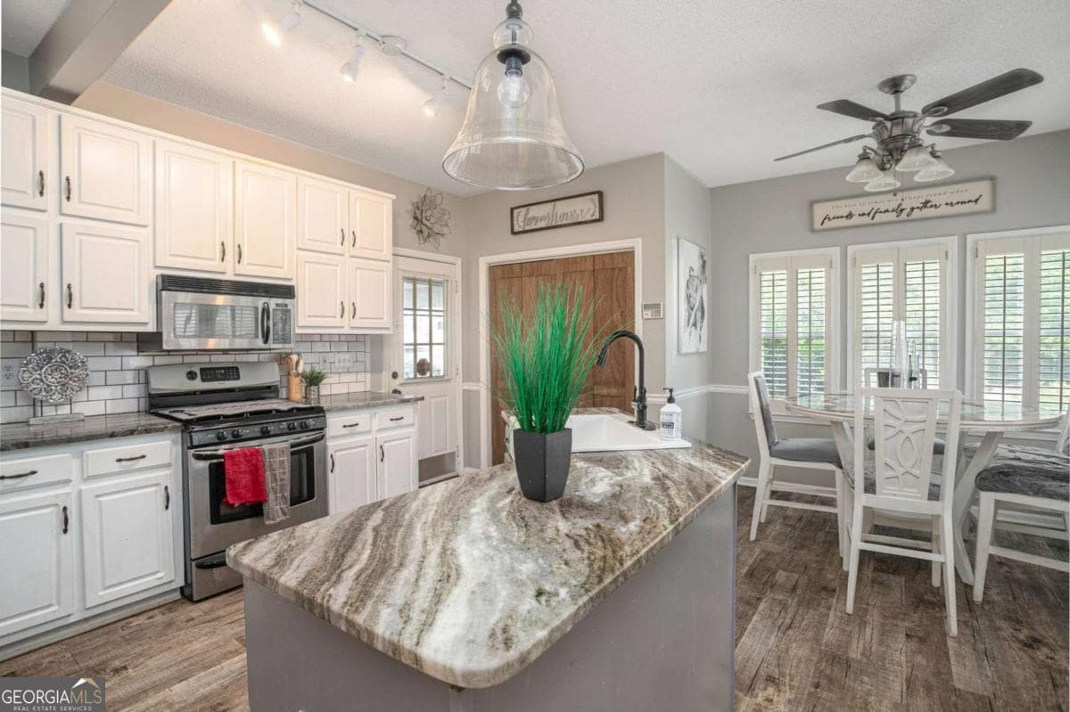 4 bedroom, 2.5 bathroom, 2,176 sq ft single family residence for sale at 2075 Whispering Pines Lane, Mcdonough, GA 30253 — photo 5