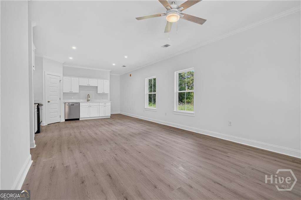 3 bedroom, 2 bathroom, 1,250 sq ft single family residence for sale at 1167 Thompson Road, Townsend, GA 31331 — photo 2