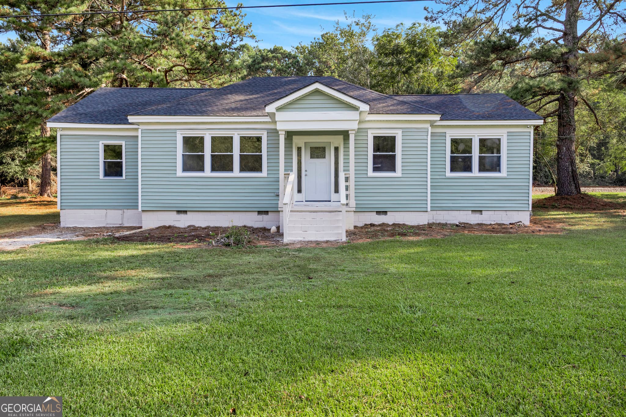 3 bedroom, 2 bathroom, 1,262 sq ft single family residence for sale at 4800 Ga Highway 11, Hillsboro, GA 31038 — photo 4