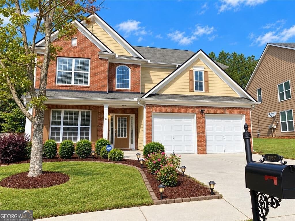 4 bedroom, 2.5 bathroom, 2,507 sq ft single family residence for sale at 1157 Balvaird Drive, Lawrenceville, GA 30045 — photo 2